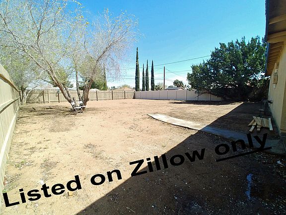 Fenced and gated backyard