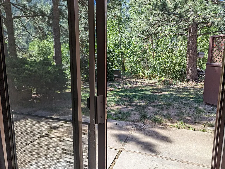 Enjoy your private patio and listen to Clear Creek rush by!