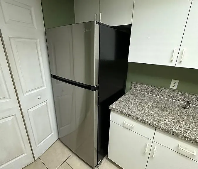 5005 Wiles Rd #102 — Photo 2