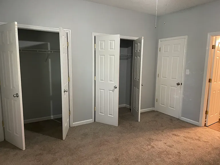 The rear bedroom has double closets and an ensuite bathroom.