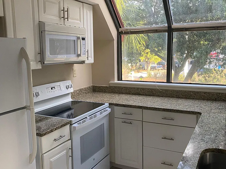 Bright kitchen with granite counters