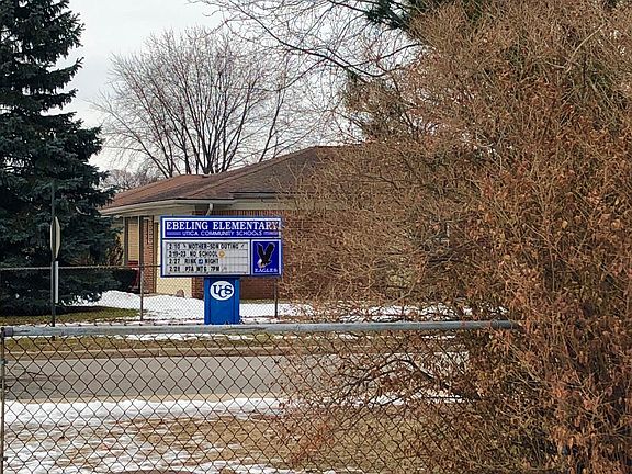 School right behind house