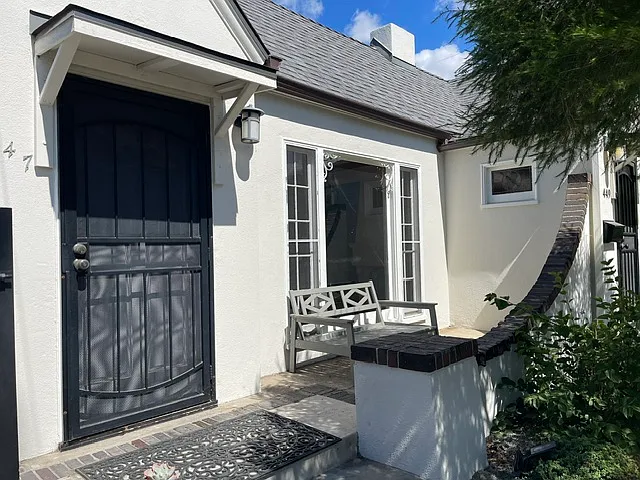 Tranquil Front Porch. A Nice Feature of this Charming 2 BDR/1 BA Retro Row Duplex Apartment.