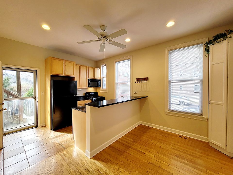Kitchen with door to back porch open