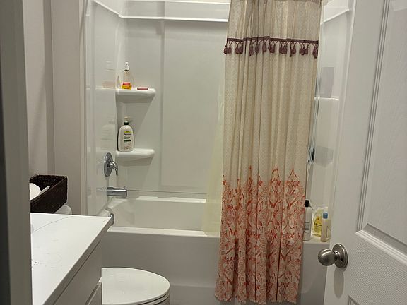 Bathroom located between bedroom 1 and 2 and 3 , easily accessible as you walk into the home.