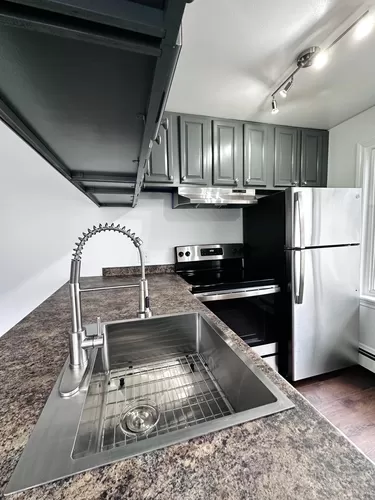 Newly renovated kitchen with brand new stainless steel appliances - 28.5 Elm St #B