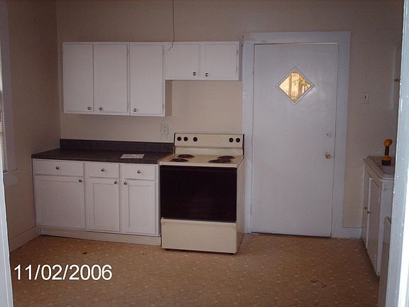 Kitchen with refrigerator and stove