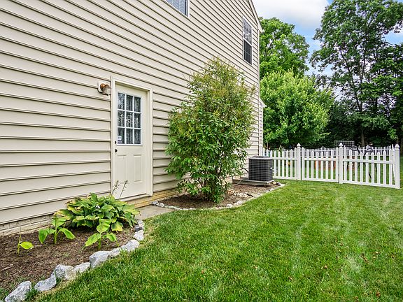 Right side with garage door entrance.