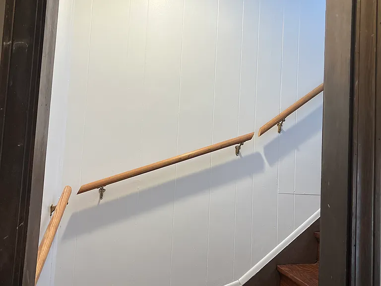 Stairwell from 2nd floor landing where Coat Closet is located, traveling one floor up to third floor apartment