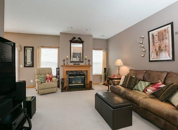 Spacious living room with vaulted ceilings and gas fireplace