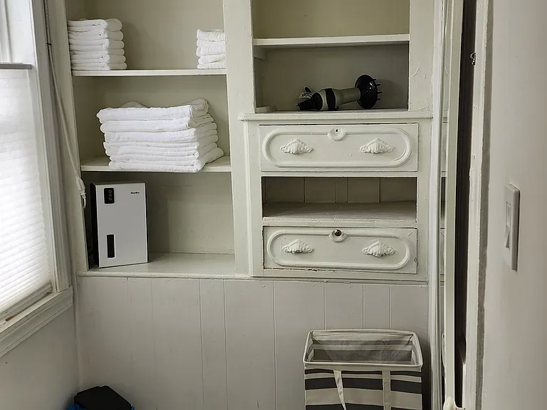 Towels, hamper, hair dryer, dehumidifier, etc.