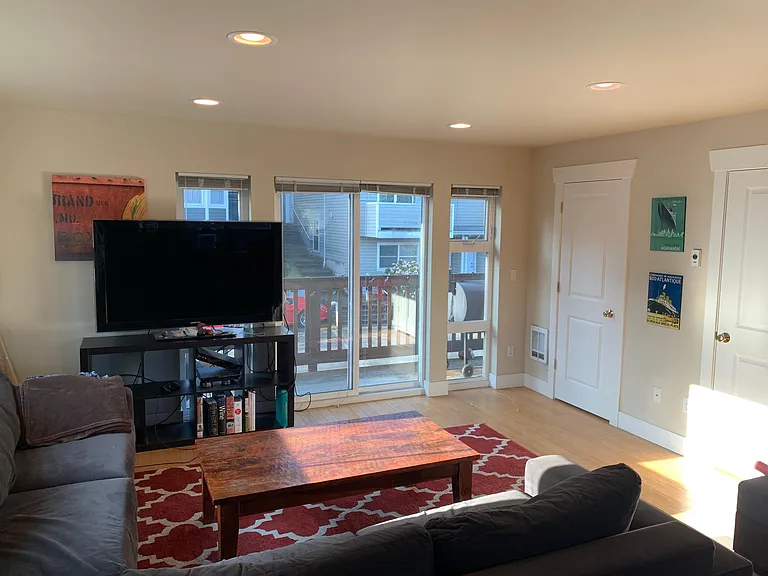 Living area and slider to balcony.