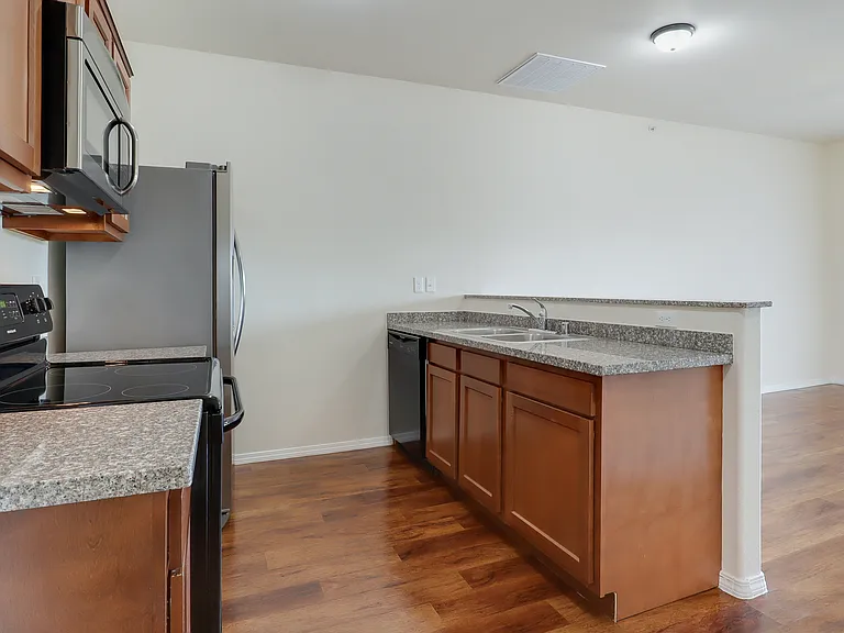 Kitchens have different layouts, but similar fixtures and finishes