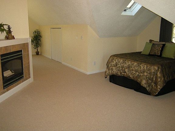 Master suite with vaulted ceilings, skylight, lots of storage.