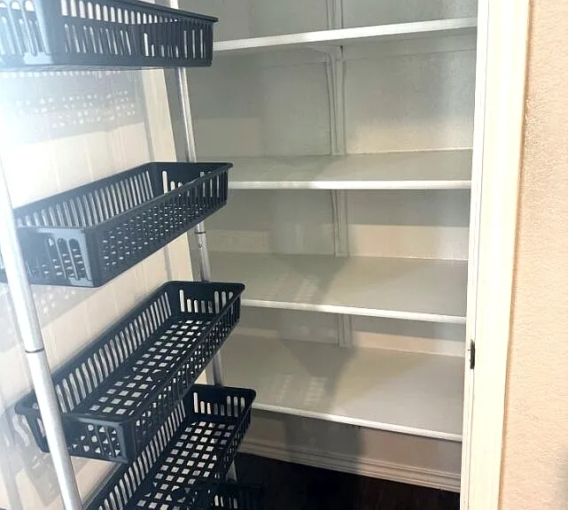 Large pantry space for extra kitchen storage.