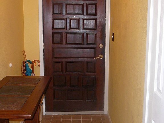 Wood entry door is nice