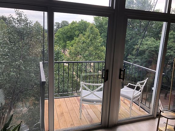 Balcony off 1st level Family Room over park