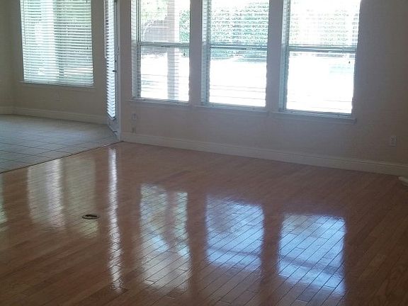 Arched windows overlook pool
