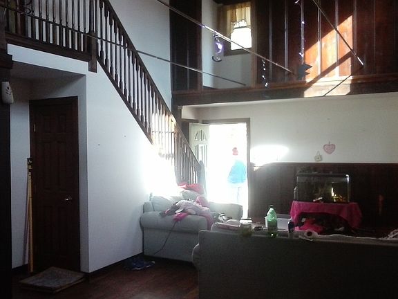 Living room, tenant in process of moving out but it does giv