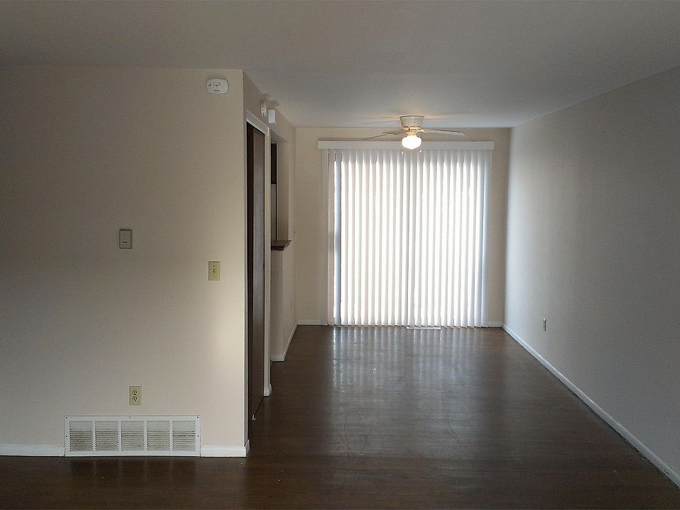 Living area with hardwood floors.