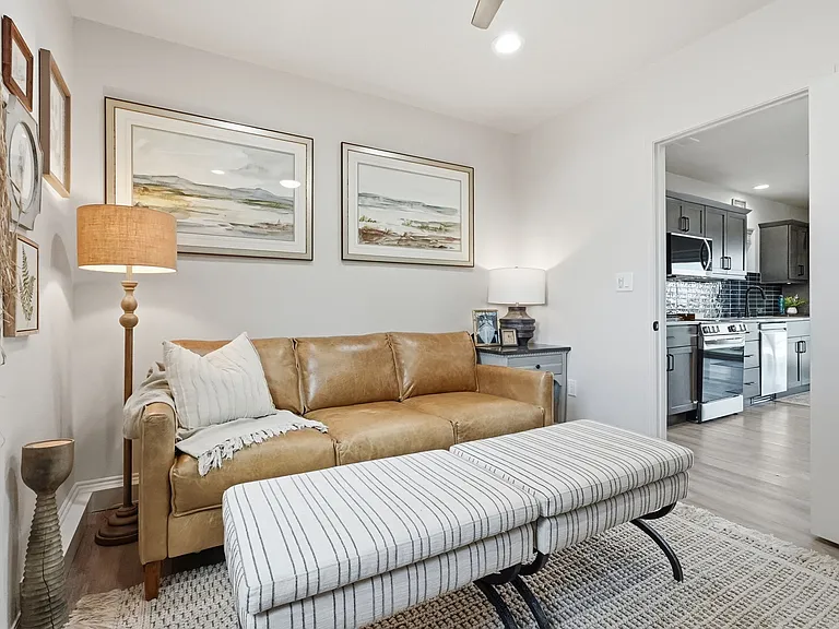Leather couch w/ queen pull-out & TV on main level.