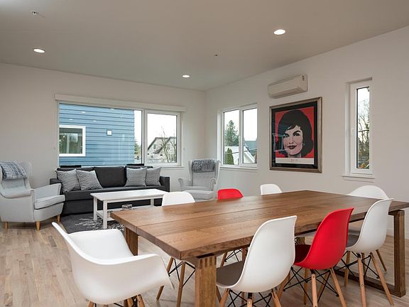 Dining & Living Rooms with Abundant Natural Light and Hardwo