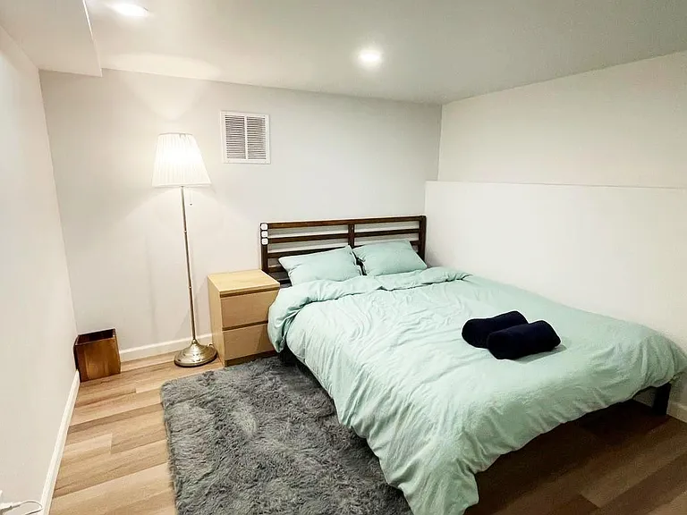 Spacious bedroom #3 (recently renovated) with queen size bed and large walk-in closet