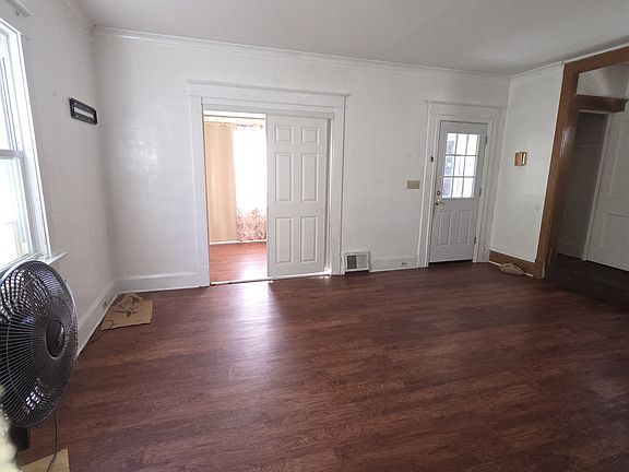 Family size living rm with sliders to Bonus room