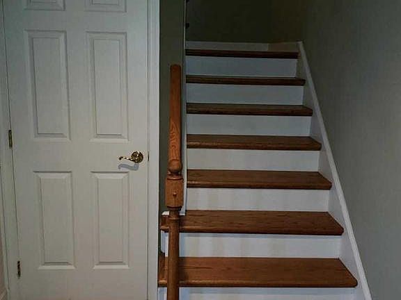 Steps to upstairs and basement door