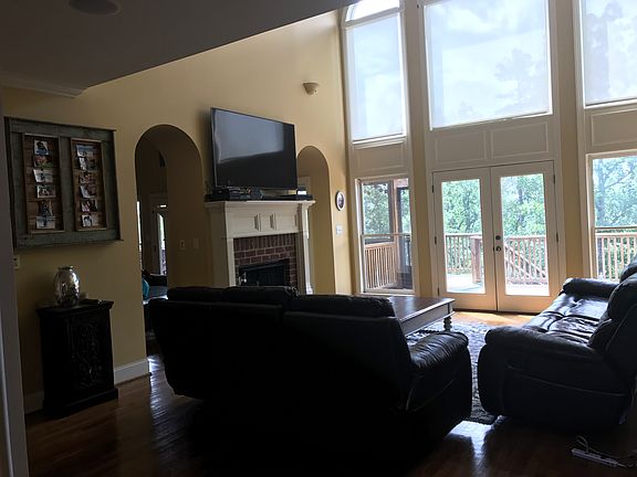 Remote retractable shades