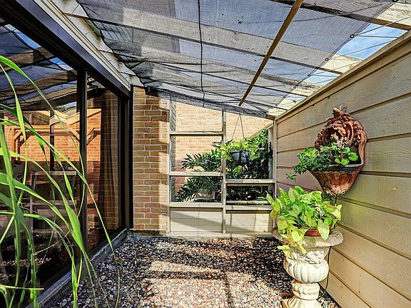 Plenty room to put your beautiful blooming plants as well as a winter home for the tender ones from outside