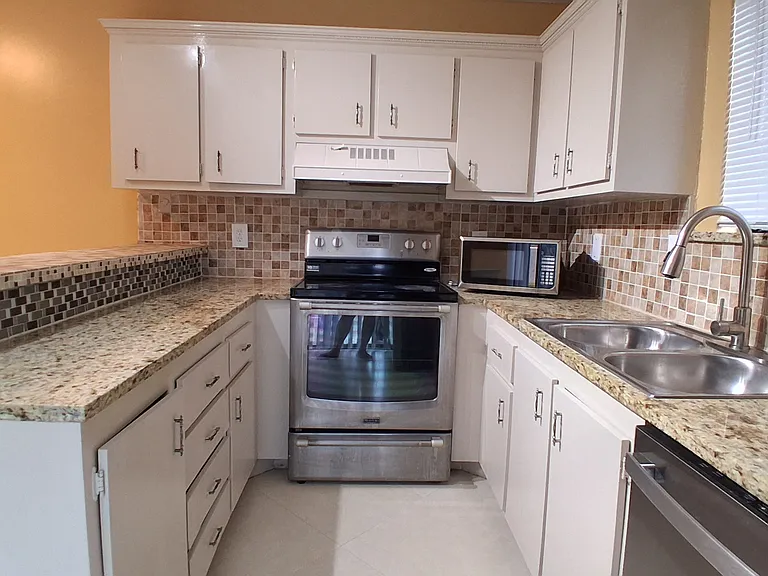 Kitchen with stainless steel appliances