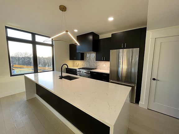 2nd image of 395 Alewife Brook Pkwy #Penthouse A