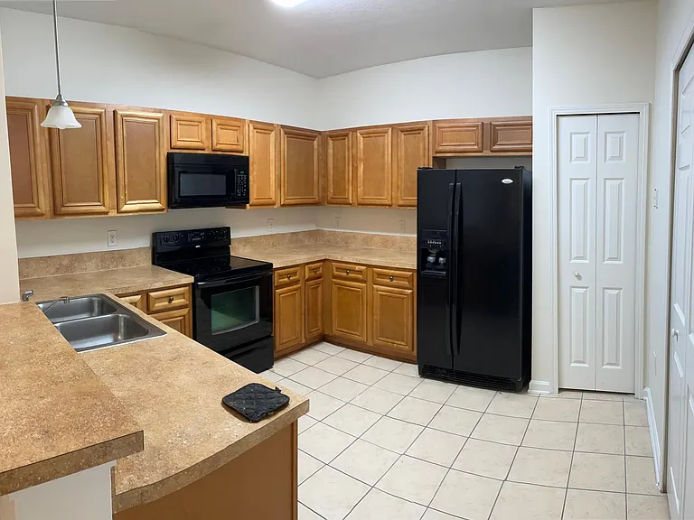 6984 Ortega Woods Dr — Photo 7