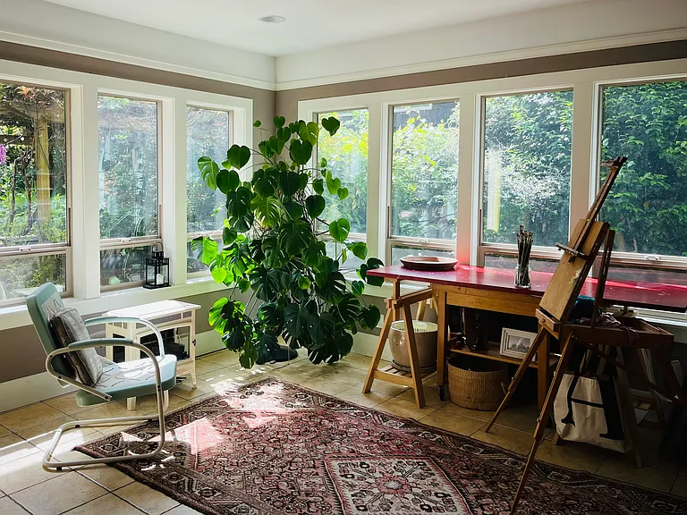 Sunroom, which opens to a large patio and the back yard