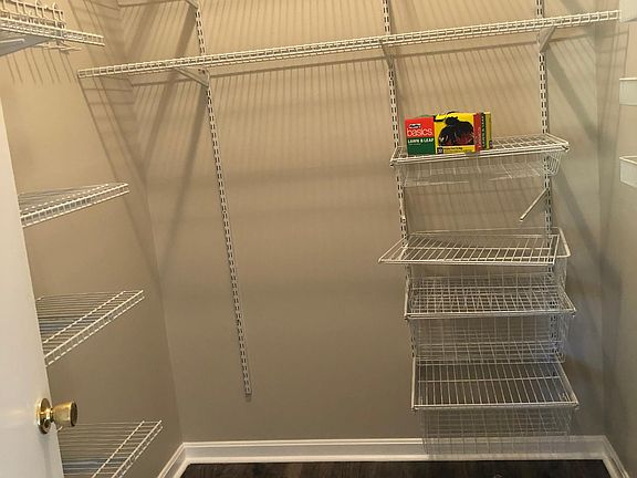 Walk in closet/storage/pantry area