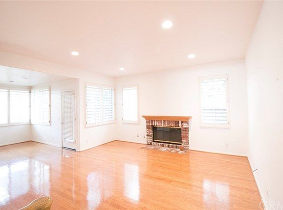 Family Room w/Fireplace, Hardwood Flooring