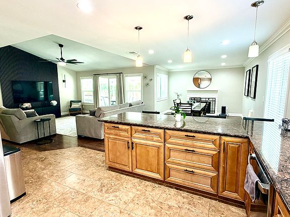 kitchen view to living and dining