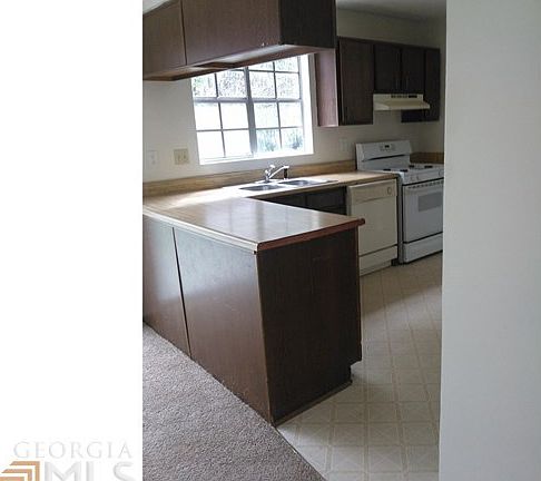 Breakfast Bar Opens to Family Room