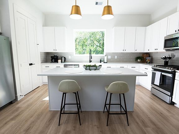 Kitchen with breakfast bar area