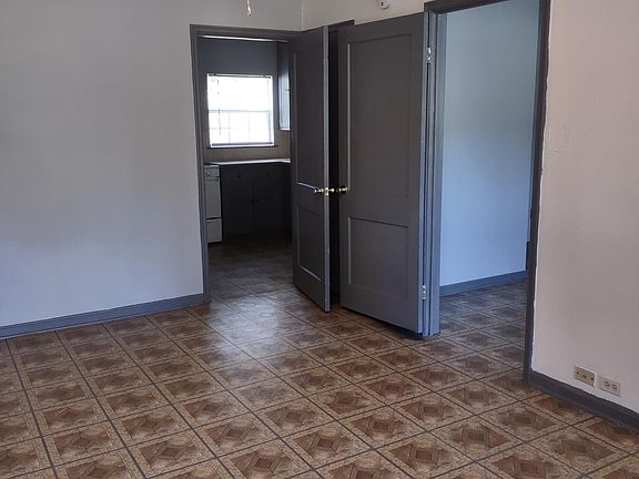 Living room, looking into kitchen