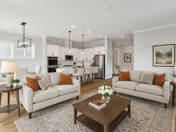 The family room in the Preston single family home by Brookfield Residential at Nexton.