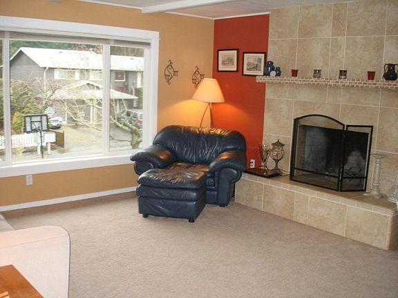 New vinyl windows and high quality blinds throughout the home. Gas burning fireplace upstairs.