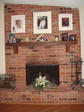 Wood burning fireplace in living room