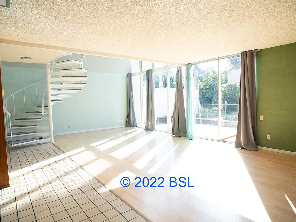 Open Concept Living, Dining & Kitchen with Huge Windows