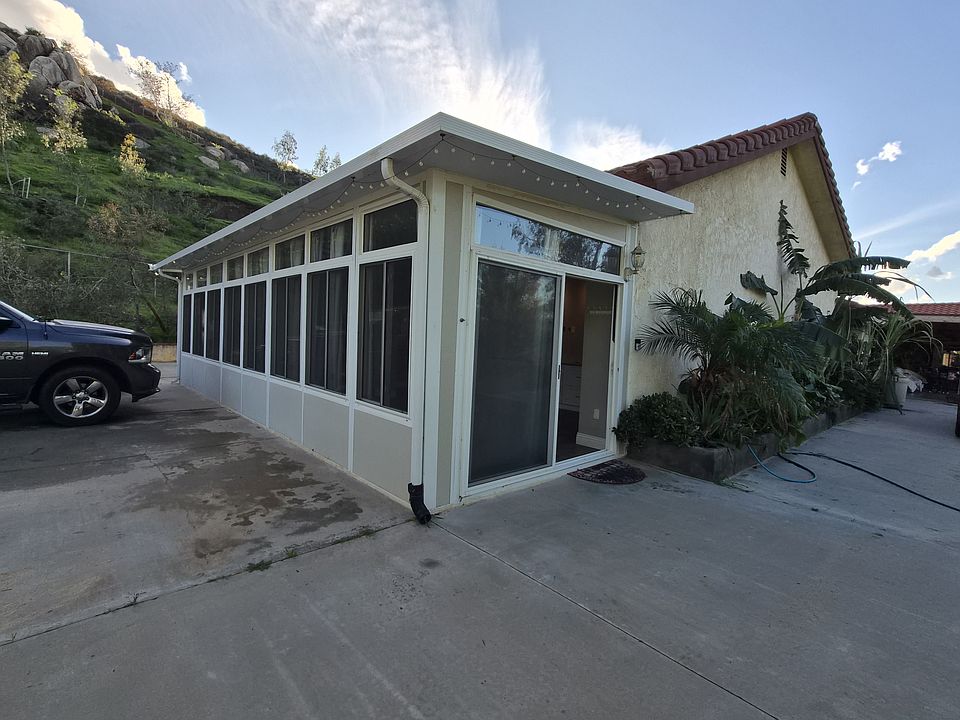 2 sliding doors pn each side of the 30x10 sunroom