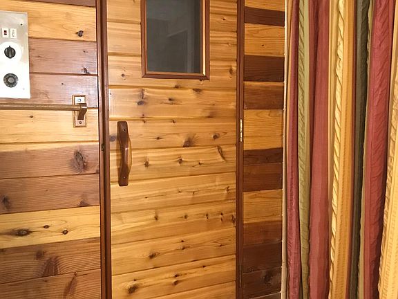 View of the sauna and shower in the basement apartment.