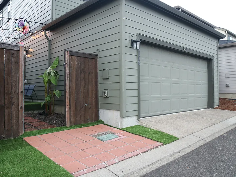 Concrete Pavers with artificial turf walkway