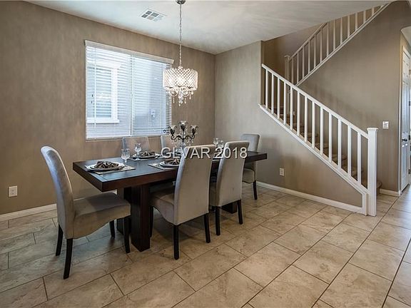 Dining Room with elegant chandeliers