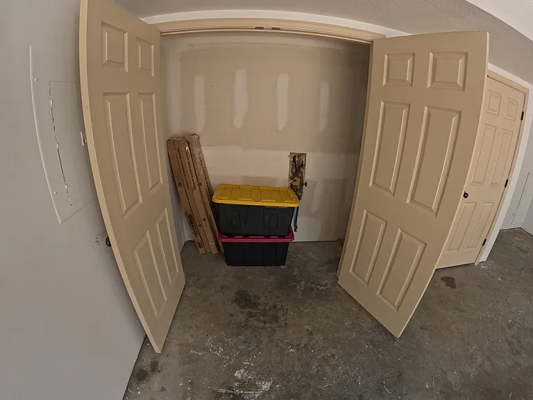 2 Car Garage - 2 Storage Rooms w/ Doors